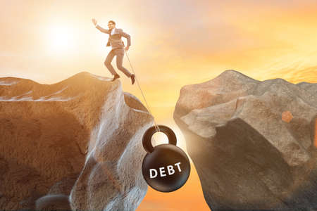 The concept of debt and load with businessmanの写真素材