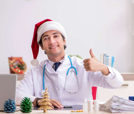 Doctor on the shift on christmas eveの写真素材