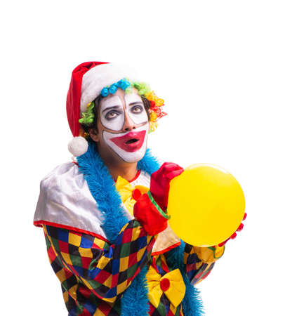 Young funny clown comedian isolated on white
