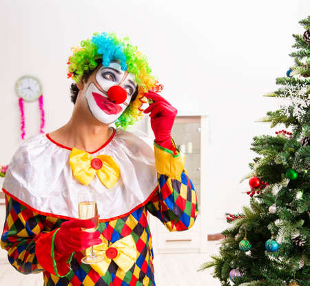 The funny clown in christmas celebration conceptの写真素材