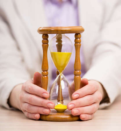 Hourglasses in business concept in time concept