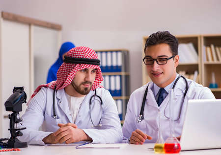 Diversity concept with doctors in hospitalの写真素材