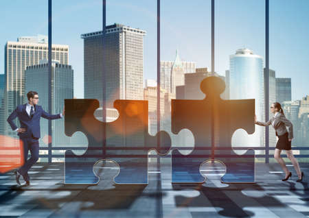 Business concept of puzzles for teamworkの写真素材