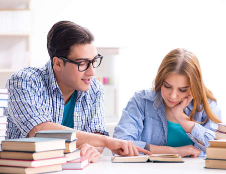 Pair of students studying for university examsの写真素材