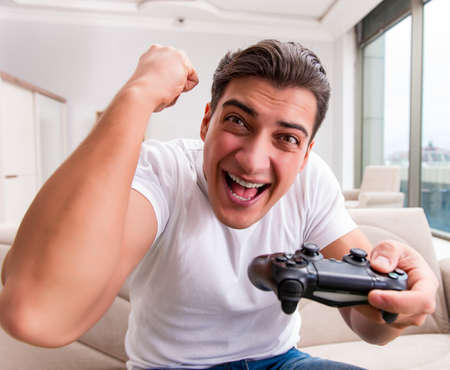 Man addicted to computer gamesの写真素材