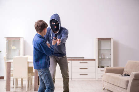 Child abduction concept with young boyの写真素材