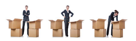 The woman businesswoman with boxes on white