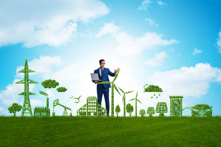 Businessman in green and the environmental conceptの写真素材