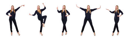 Tall young woman in black clothing isolated on whiteの写真素材