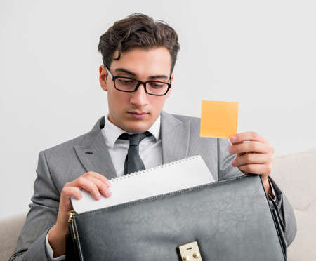 Businessman with briefcase in business concept