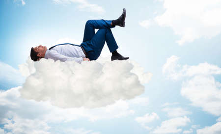 The young male businessman enjoying his time during vacationの写真素材