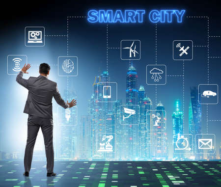Concept of smart city with businessman pressing buttonsの写真素材