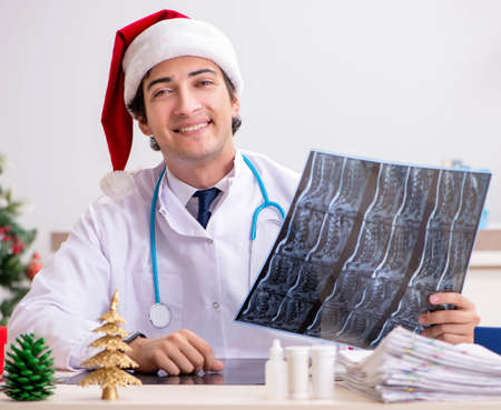 Doctor on the shift on christmas eve