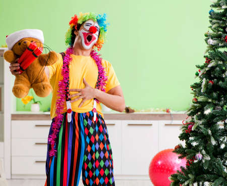 The funny clown in christmas celebration conceptの写真素材