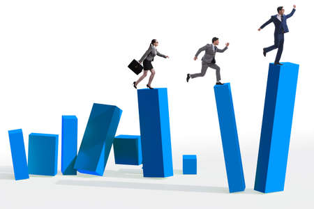 Business people in a collapsing economy conceptの写真素材