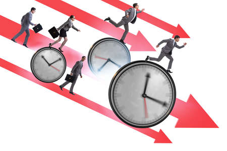 The concept of the recession and decline with time clocksの写真素材