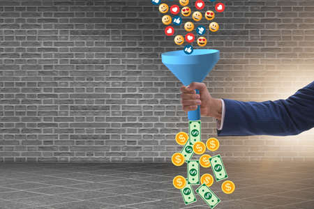 Social network monetization concept with businessmanの写真素材
