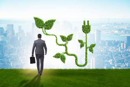 Green energy concept with the businessmanの写真素材