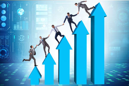 Colleagues helping each other to improve resultsの写真素材