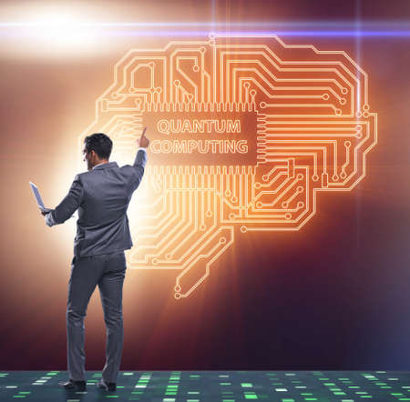 The businessman pressing virtual button in quantum computing concept