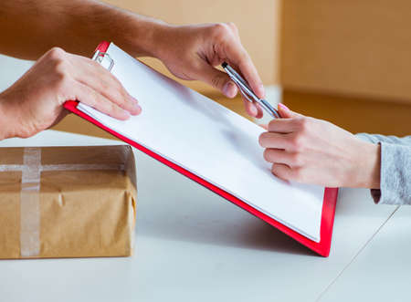 Delivery man delivering parcel box