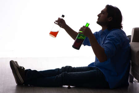Young man suffering from alcoholism