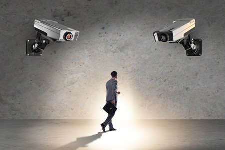 Cameras wathing man in the spying concept