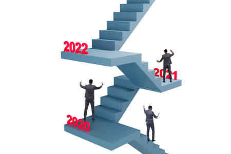 Businessman climbing stairs on yearly basis