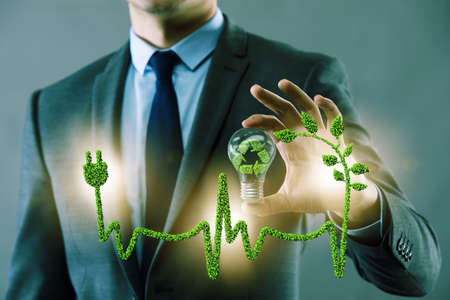Green energy concept with businessmanの写真素材
