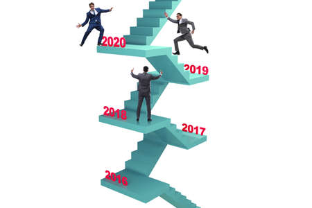 Businessman climbing stairs on yearly basis