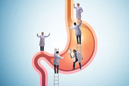 Doctors examining stomach in medical concept