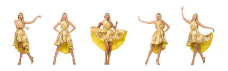 The young woman in long floral dress isolated on whiteの写真素材