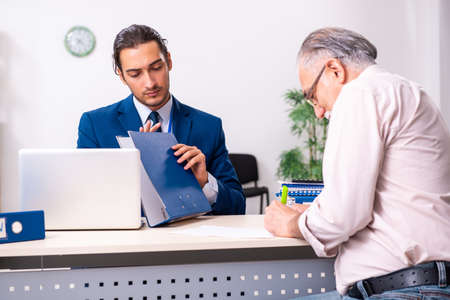 Financial advisor giving retirement advice to old man