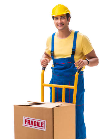 Young contractor with fragile boxes isolated on whiteの写真素材