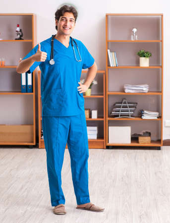 Young handsome doctor radiologyst working in clinicの写真素材