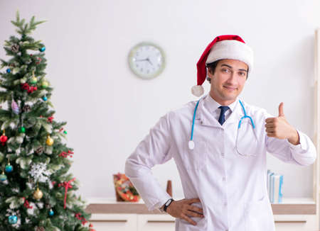 Doctor on the shift on christmas eveの写真素材