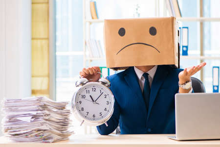 The unhappy man with box instead of his head
