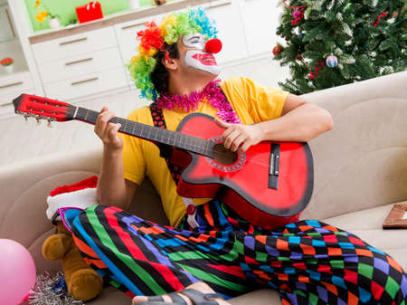 The funny clown in christmas celebration conceptの写真素材