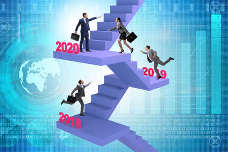 Businessman climbing stairs on yearly basis