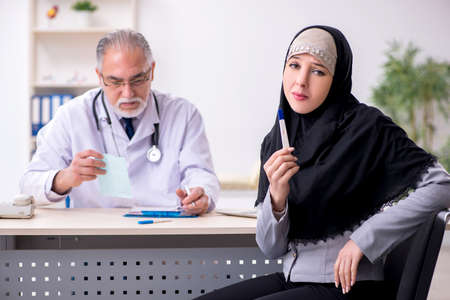 Arab woman visiting experienced doctorの写真素材
