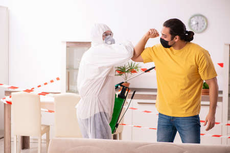 Sanitizer and young man indoors in disinfection concept