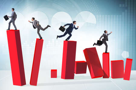 Business people in a collapsing economy concept
