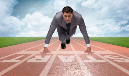 Businessman taking low start to running