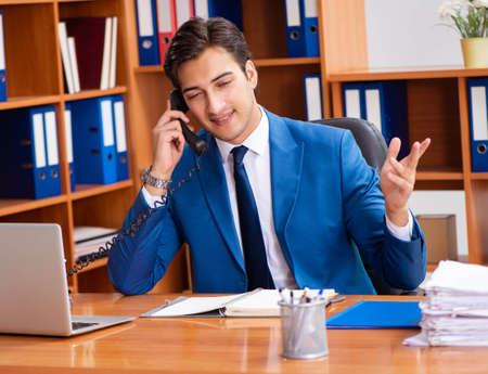 Young employee working in the office