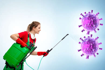 Disinfection concept with person fighting coronavirus