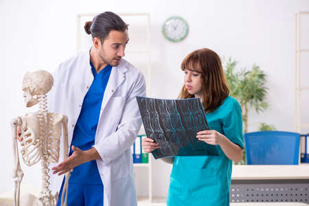 Two doctors colleagues working in the hospital