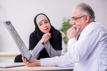 Arab woman visiting experienced doctorの写真素材