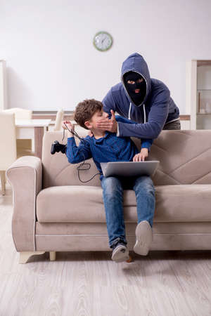 Child abduction concept with young boyの写真素材