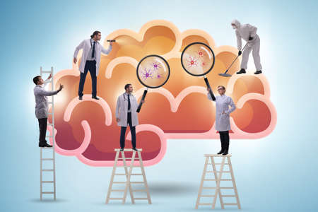 The team of doctors examining the human brainの写真素材