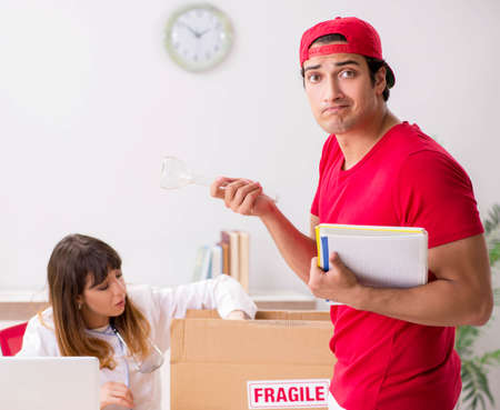Courier delivering urgent parcel to the hospitalの写真素材